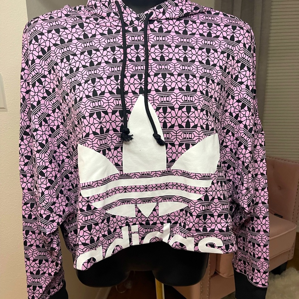 Brand new Adidas sweat shirt.